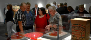 Museum donors looking at one of its exhibits