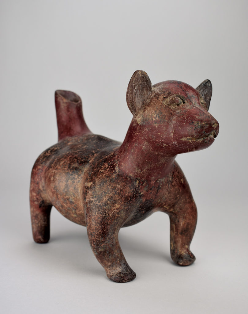 A effigy of a small chubby dog with stubby legs