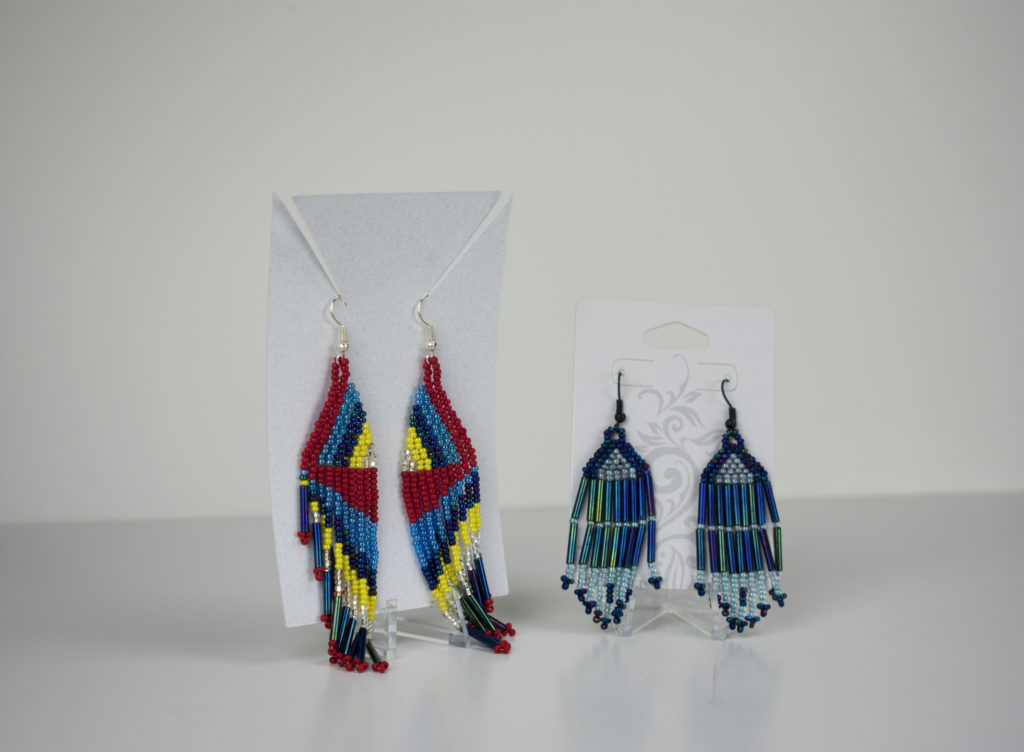 A pair of beaded earrings by Eveline Steele