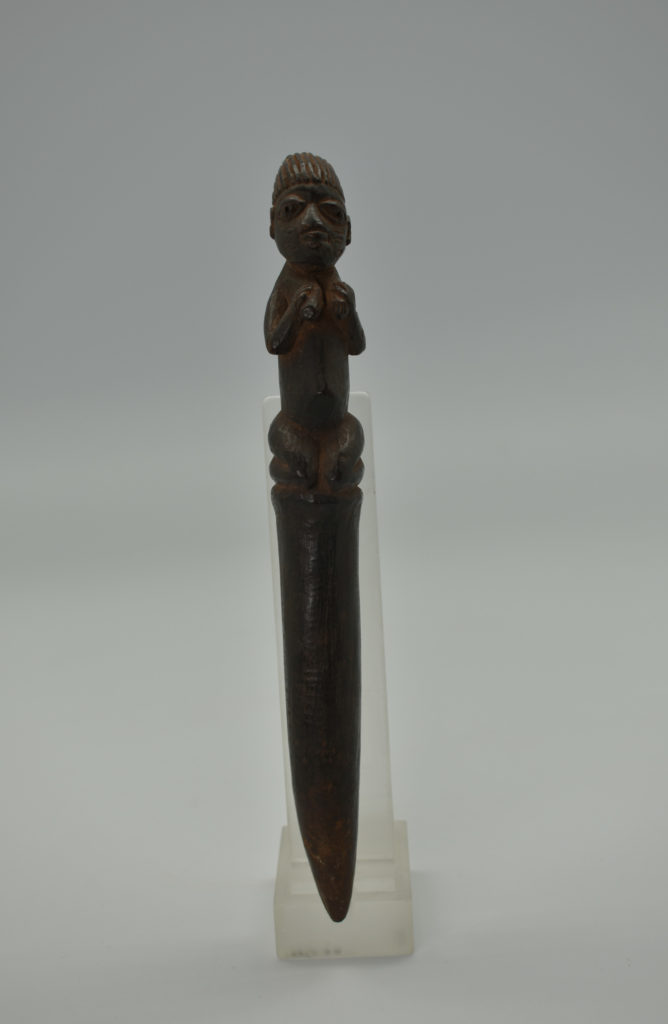 A plain wooden divination tapper from Africa