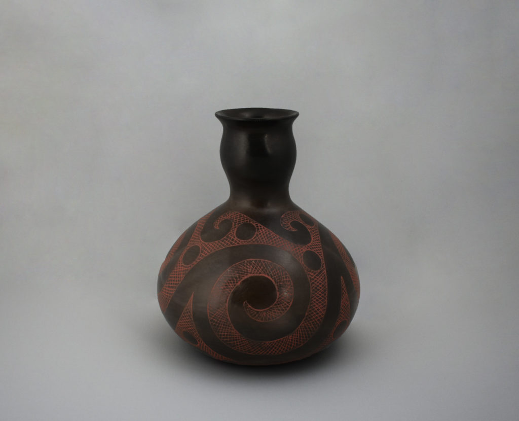 A small, glazed, "hodges-engraved" style pot by Jeri Redcorn