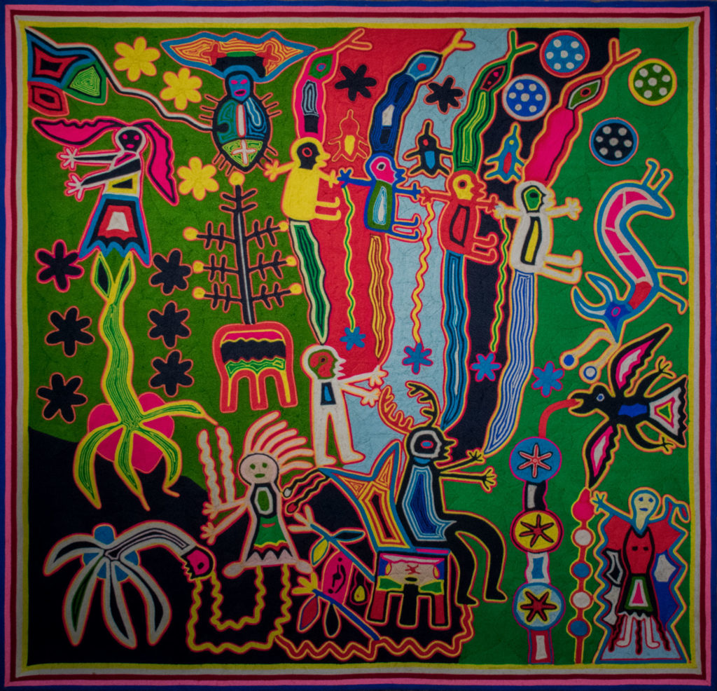 A multi-colored Huichol yarn painting inspired by peyote pilgrimages